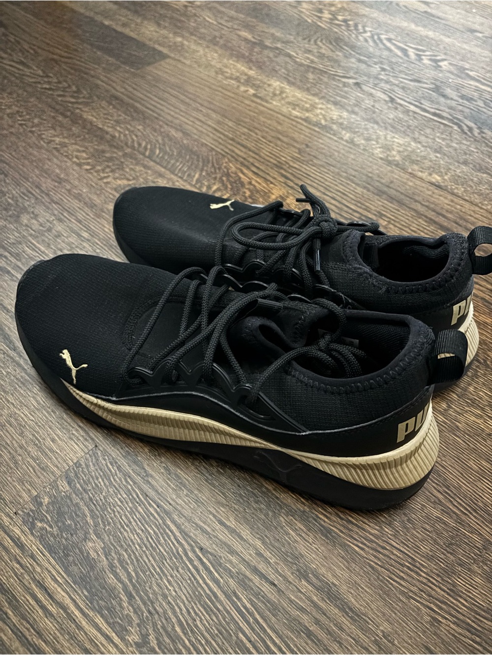 Puma Women’s Future Pace Black and Gold Low-Top Athletic Sneakers